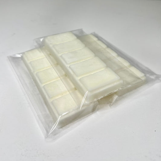 Three laundry day (white color) wax melt bars on white background. 